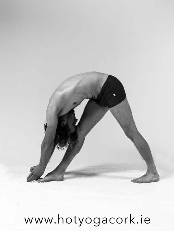 Hot Yoga Standing Separate Leg Head to Knee Pose - Dandayamana Bibhaktapada Janushirasana